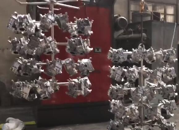 汽車配件吊鉤式拋丸機(jī) 汽車配件吊鉤式拋丸機(jī)